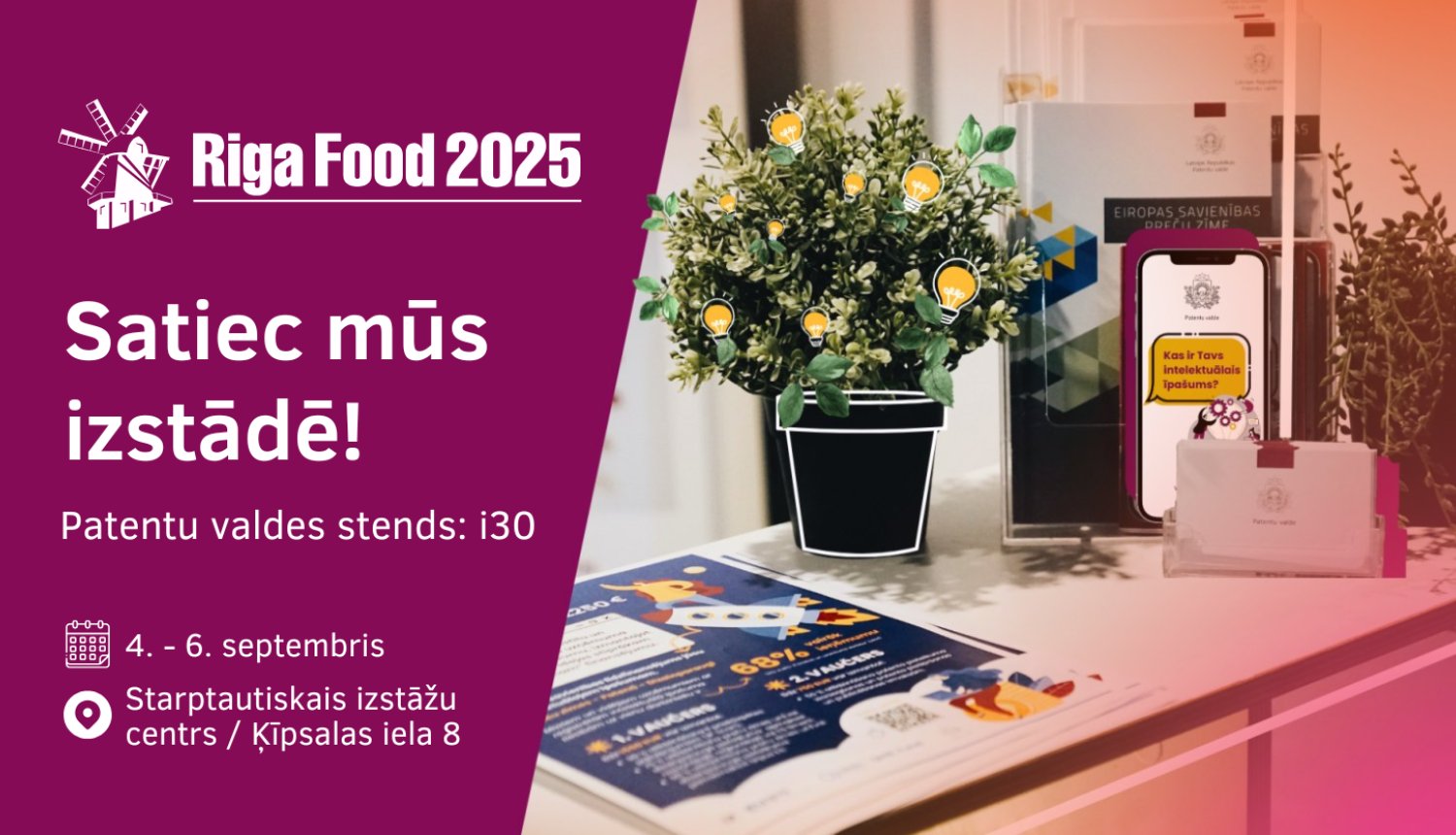 Baneris ar galveno informāciju un galds, kuram virsū buklets, augs un vizītkartes